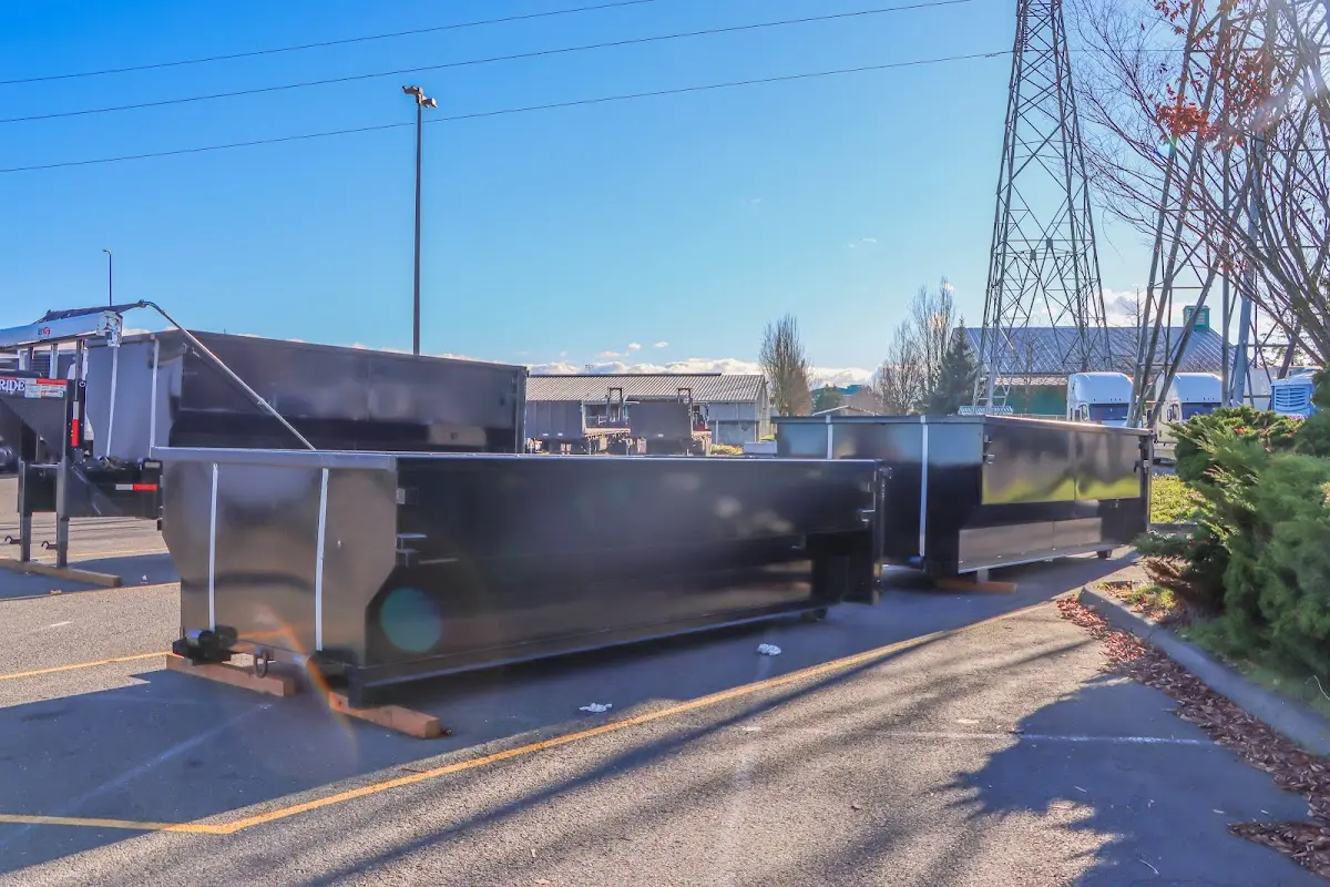 Roll-off dumpster ready for waste disposal at job site for 4 Yard Dumpster Rental in Ayer